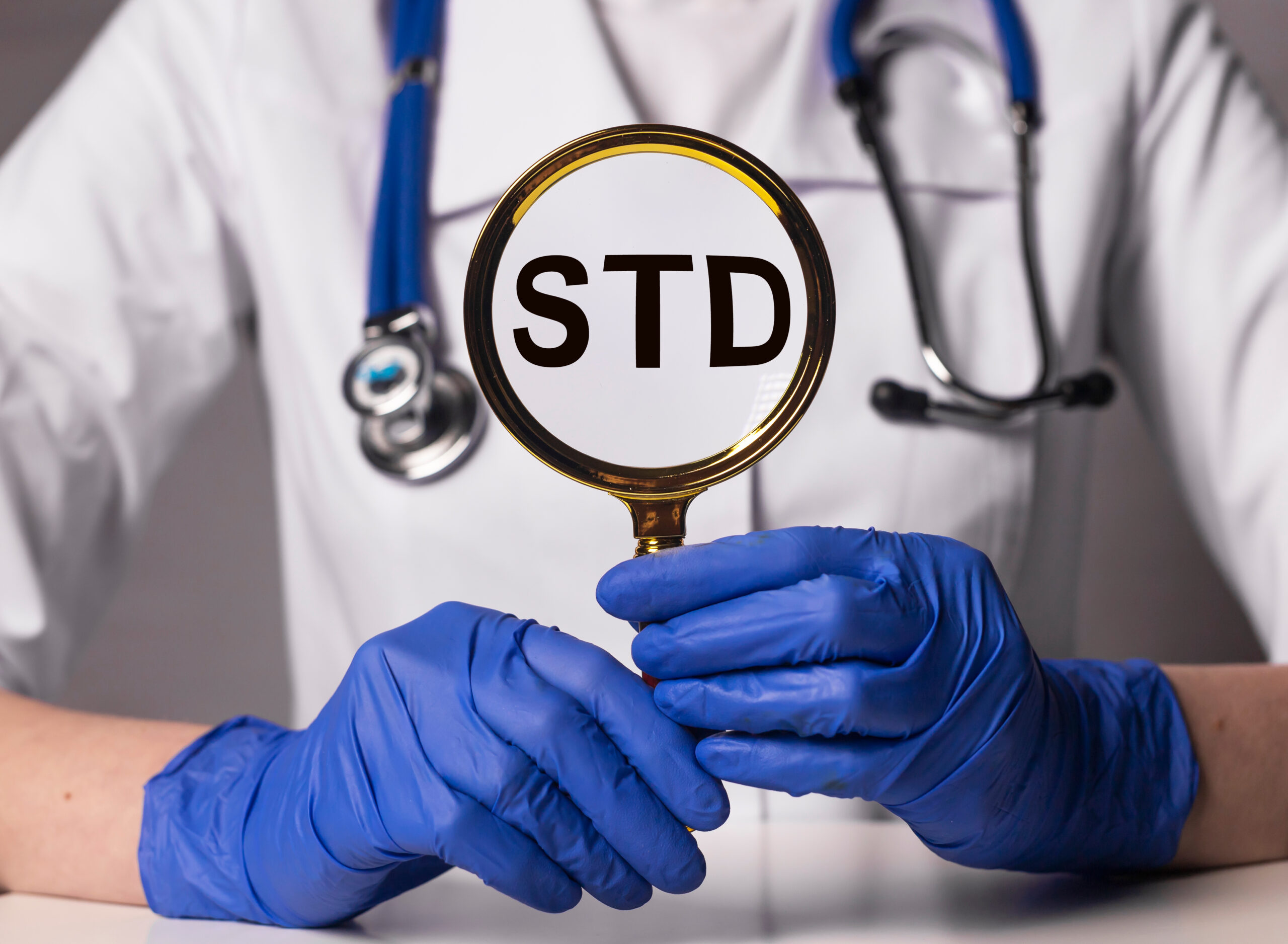 Std,Acronym,Inscription,In,Doctor,Hands,Through,Magnifier.